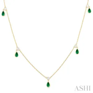 1/8 ctw Round Cut Diamonds and 5X3MM Pear Shape Emerald Precious Station Necklace in 10K Yellow Gold