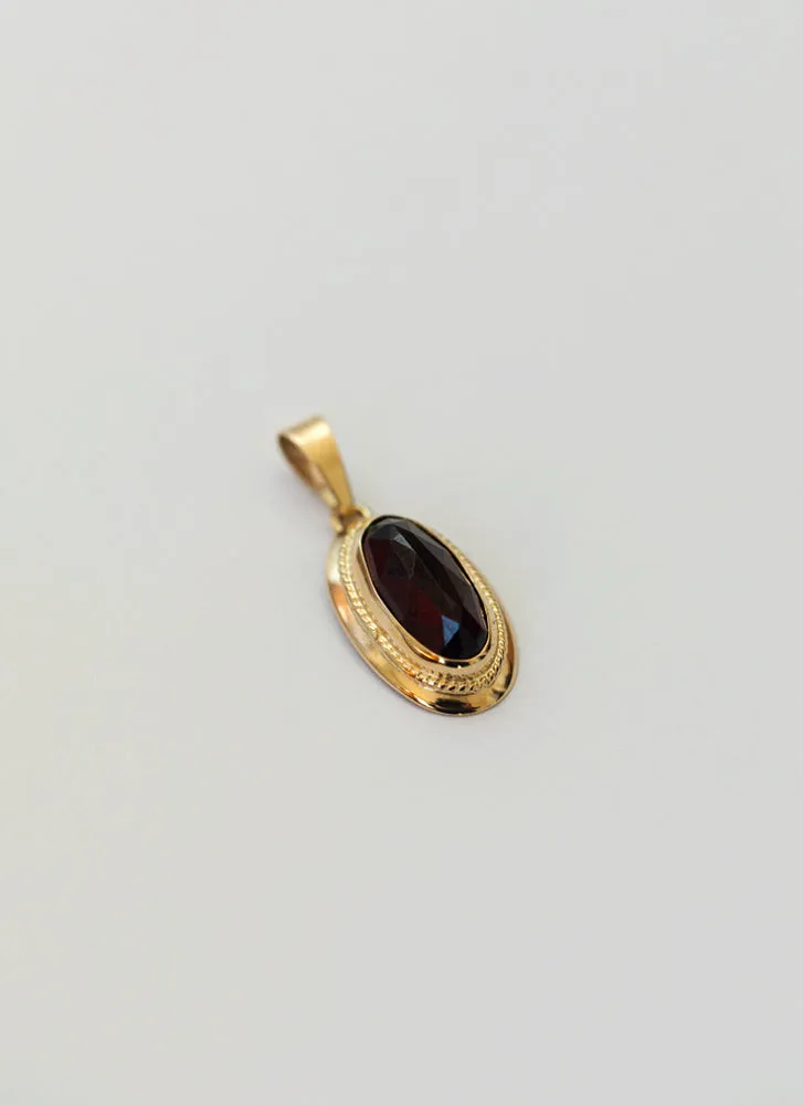 Lowe garnet charm 14k gold